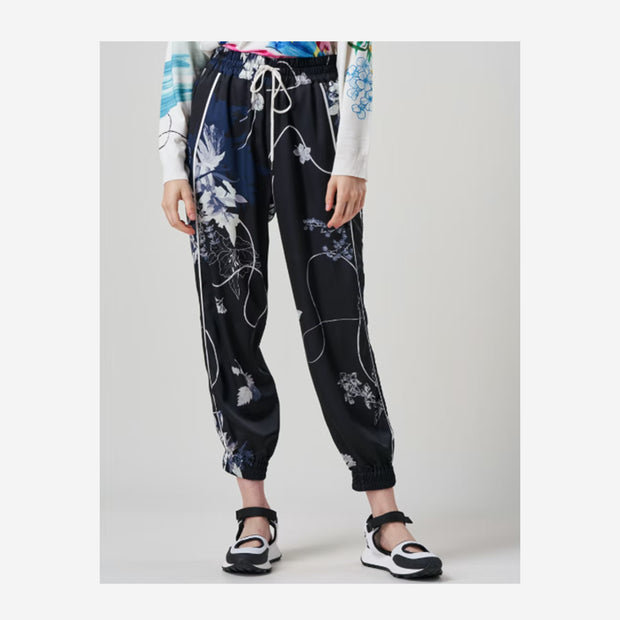 FRILICSOME NAVY JOGGERS PANT IN FLORAL PRINT TECH SATIN